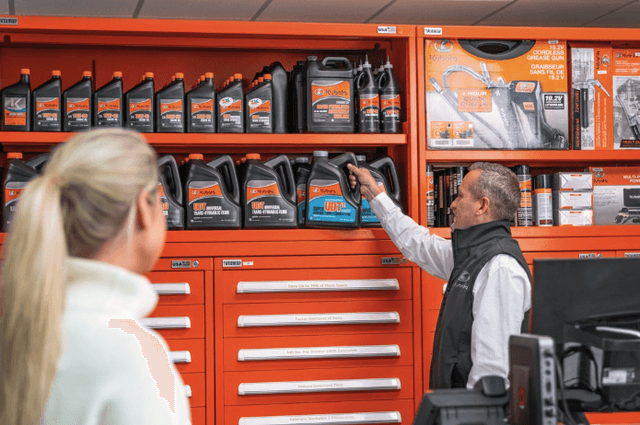 Kubota employee helping a customer