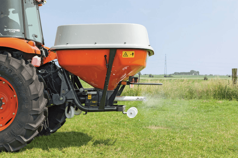 Spreader attached to rear tractor