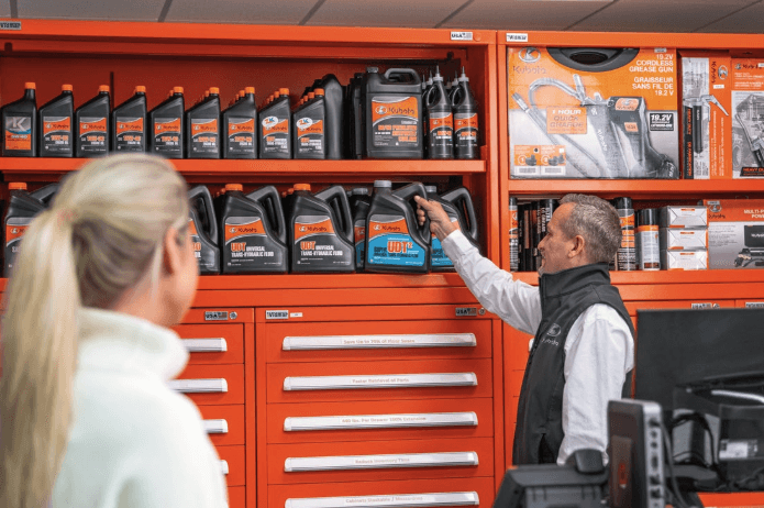 Kubota employee helping a customer